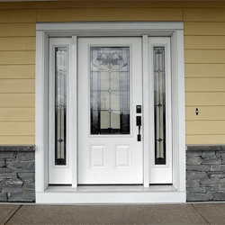 Smooth Fibreglass exterior door with two sidelites. Bellflower decorative glass. Professionally painted.