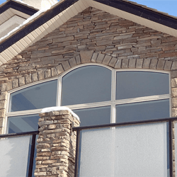 Custom shaped replacement windows on home.