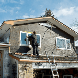 New replacement windows are put into place.